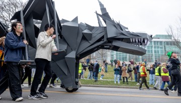 The dragon passes in front of the Physical Sciences building. 